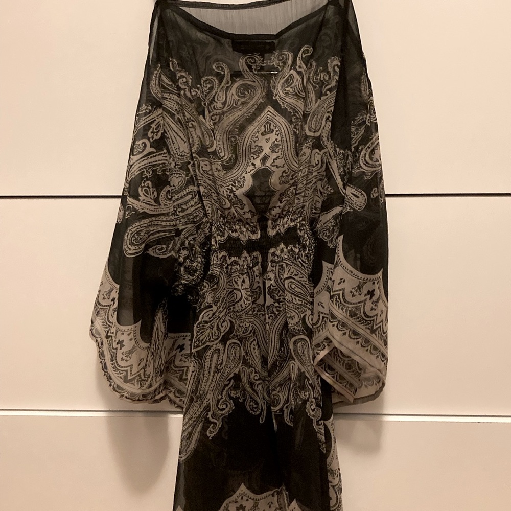 Sheer black top with designs